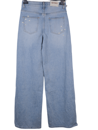 Jeans a vita alta con applicazioni