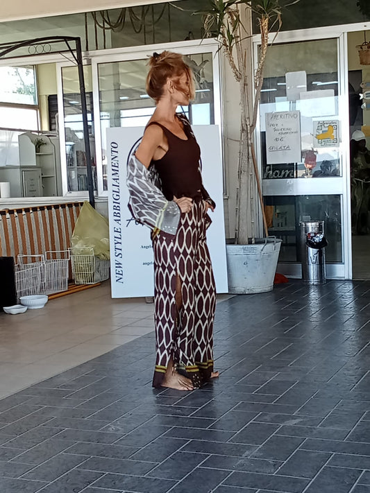 completo pantalone + canotta foto